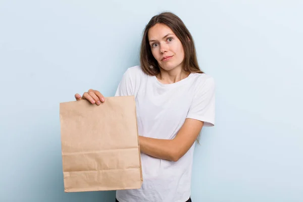 Young Adult Woman Shrugging Feeling Confused Uncertain Delivery Take Away — Stockfoto