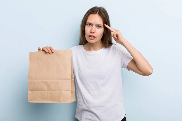 Young Adult Woman Feeling Confused Puzzled Showing You Insane Delivery — Stockfoto