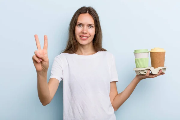 Young Adult Woman Smiling Looking Happy Gesturing Victory Peace Take — Stockfoto