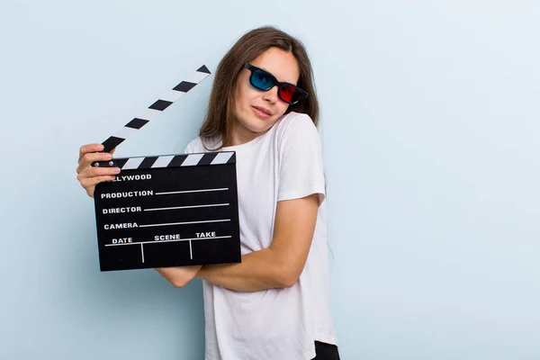 Young Adult Woman Shrugging Feeling Confused Uncertain Movie Cinema Concept — Stock Photo, Image