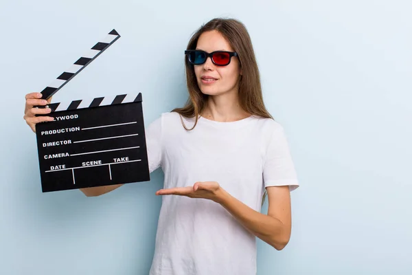 Young Adult Woman Smiling Cheerfully Feeling Happy Showing Concept Movie — Stockfoto