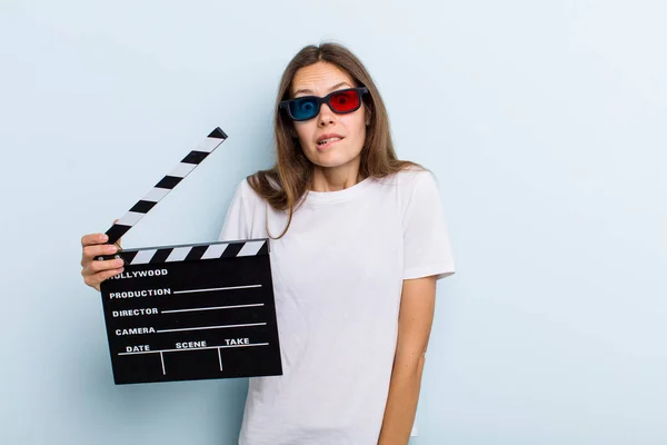 Young Adult Woman Looking Puzzled Confused Movie Cinema Concept — Stockfoto