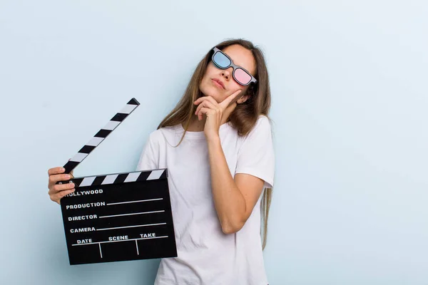 Young Adult Woman Thinking Feeling Doubtful Confused Movie Cinema Concept — Stockfoto