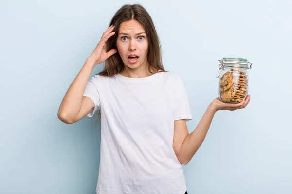 Young Adult Woman Screaming Hands Air Home Made Cookies — Stockfoto