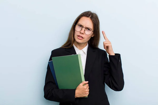 Young Adult Woman Feeling Confused Puzzled Showing You Insane University — Foto Stock