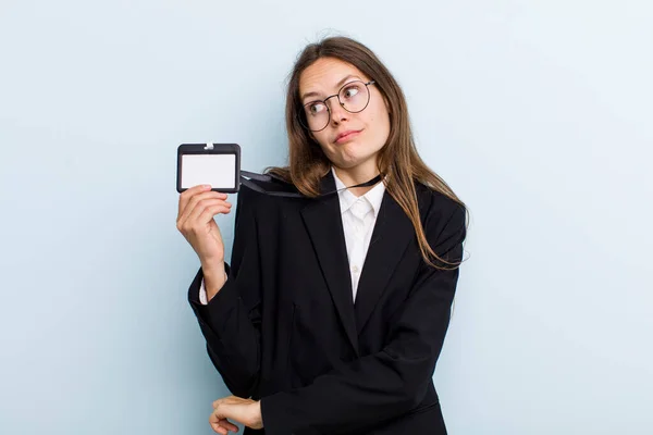 Young Adult Woman Shrugging Feeling Confused Uncertain Vip Pass Concept — Stockfoto