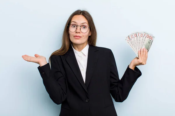 Young Adult Woman Feeling Puzzled Confused Doubting Dollar Banknotes Concept — Fotografia de Stock