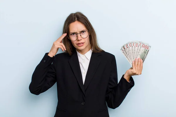 Young Adult Woman Feeling Confused Puzzled Showing You Insane Dollar — Stock fotografie