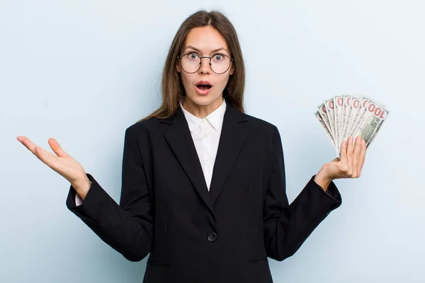 Young Adult Woman Feeling Extremely Shocked Surprised Dollar Banknotes Concept — Stockfoto