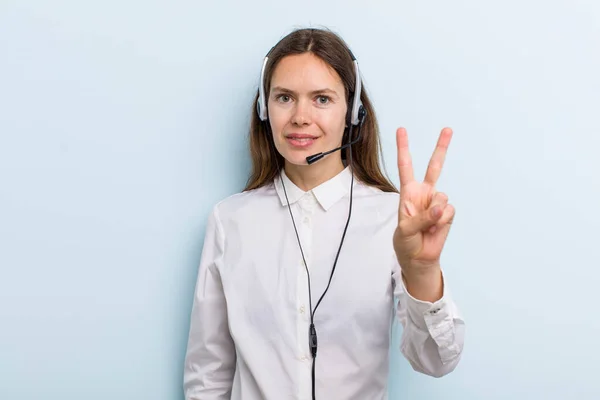 Young Adult Woman Smiling Looking Happy Gesturing Victory Peace Telemarketer — Fotografia de Stock