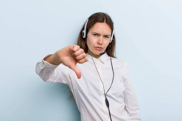 Young Adult Woman Feeling Cross Showing Thumbs Telemarketer Concept — Stock Photo, Image