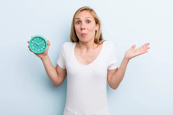 Blonde Young Adult Woman Feeling Puzzled Confused Doubting Alarm Clock — Photo