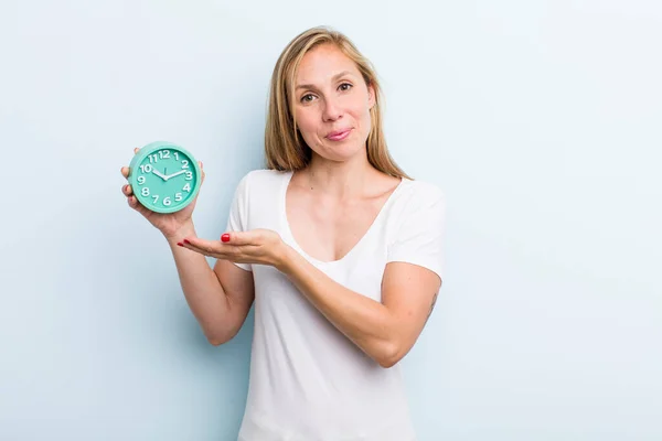 Blonde Young Adult Woman Smiling Happily Friendly Offering Showing Concept — Stock Fotó