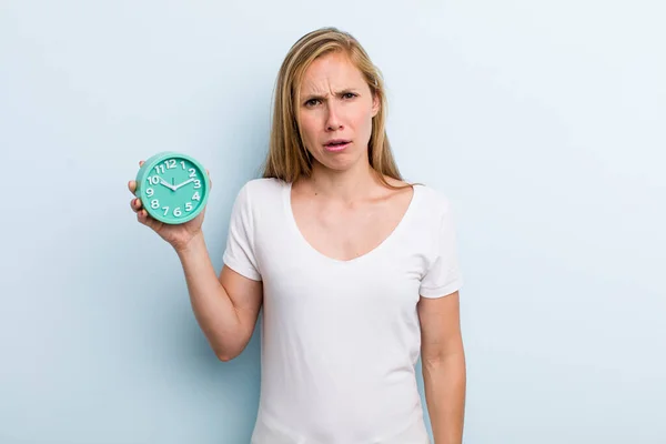 Blonde Young Adult Woman Feeling Puzzled Confused Alarm Clock Concept — ストック写真