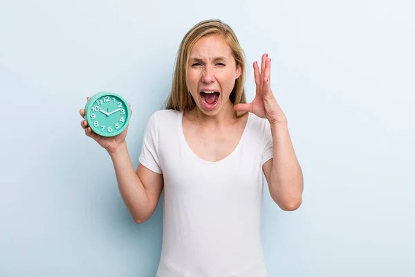Blonde Young Adult Woman Screaming Hands Air Alarm Clock Concept — Stock Fotó
