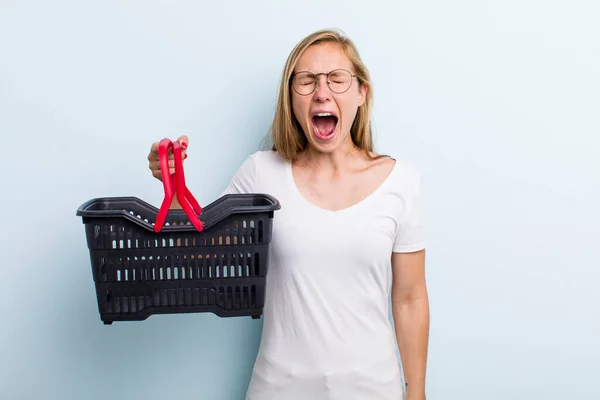 Blonde Young Adult Woman Shouting Aggressively Looking Very Angry Shopping — Stockfoto