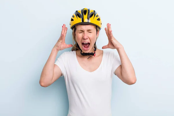 Blonde Young Adult Woman Screaming Hands Air Bike Helmet Concept — Stockfoto