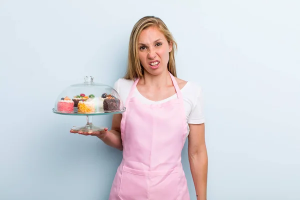 Blonde Young Adult Woman Feeling Puzzled Confused Home Made Cakes — Stockfoto