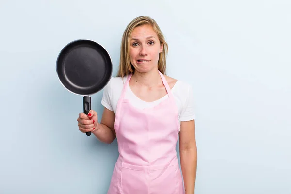 Blonde Young Adult Woman Looking Puzzled Confused Chef Concept — Fotografia de Stock