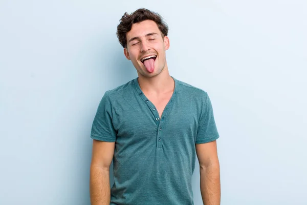 Young Handsome Man Cheerful Carefree Rebellious Attitude Joking Sticking Tongue — Stock Photo, Image