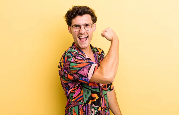 Young Handsome Man Feeling Happy Satisfied Powerful Flexing Fit Muscular — Stock Photo, Image