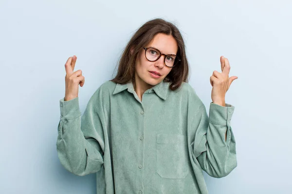 Young Adult Pretty Woman Crossing Fingers Anxiously Hoping Good Luck — Foto Stock