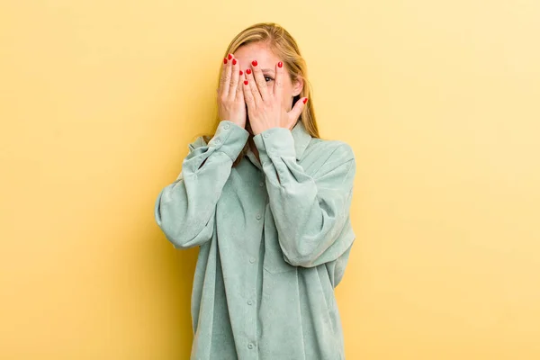 Young Adult Blonde Pretty Woman Covering Face Hands Peeking Fingers — Foto Stock