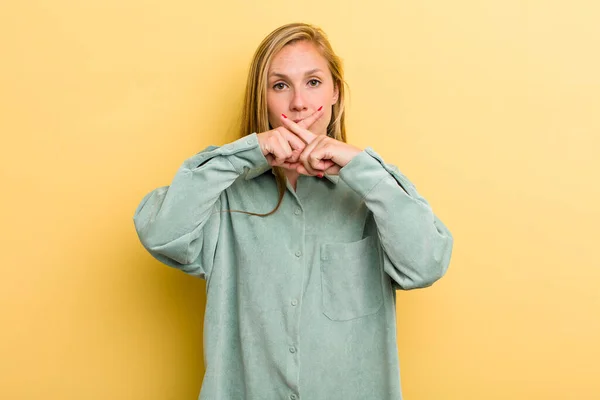 Young Adult Blonde Pretty Woman Looking Serious Displeased Both Fingers — Zdjęcie stockowe