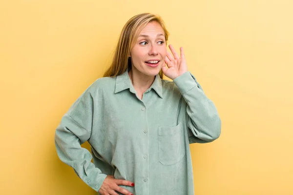 Young Adult Blonde Pretty Woman Smiling Looking Curiously Side Trying — Zdjęcie stockowe