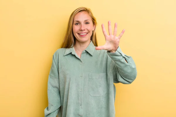 Young Adult Blonde Pretty Woman Smiling Looking Friendly Showing Number — Stockfoto
