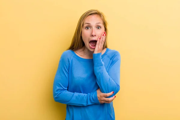 Young Adult Blonde Pretty Woman Open Mouthed Shock Disbelief Hand — Stockfoto