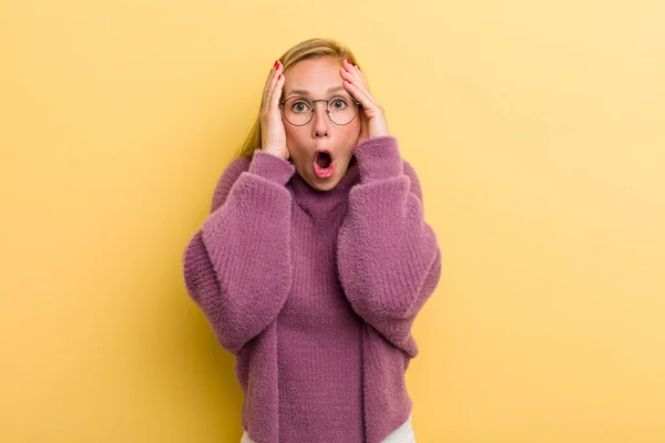 Young Adult Blonde Pretty Woman Feeling Horrified Shocked Raising Hands — Foto Stock