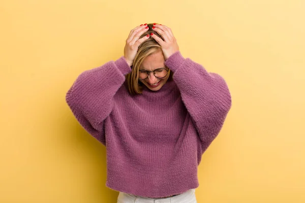 Young Adult Blonde Pretty Woman Feeling Stressed Frustrated Raising Hands — Stockfoto