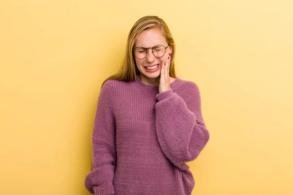 Young Adult Blonde Pretty Woman Holding Cheek Suffering Painful Toothache — Stockfoto