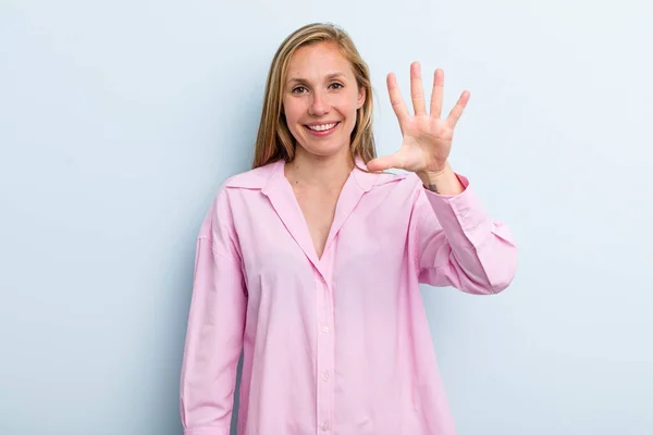 Young Adult Blonde Pretty Woman Smiling Looking Friendly Showing Number — Stockfoto