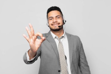 hispanic businessman happy expression telemarketer concept