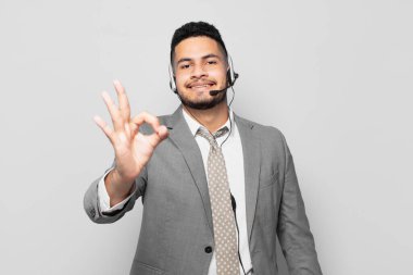 hispanic businessman happy expression telemarketer concept