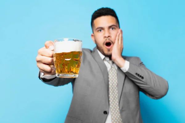 Hispanic Businessman Scared Expression Holding Beer — Zdjęcie stockowe