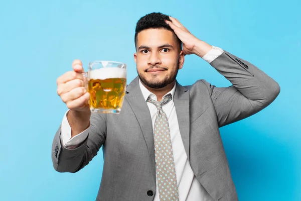 Hispanic Businessman Scared Expression Holding Beer — Stock fotografie