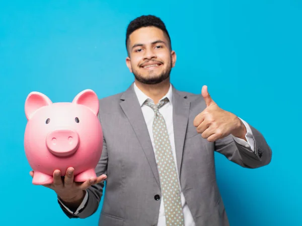 Hispanic Businessman Happy Expression Holding Piggy Bank — Stock Fotó
