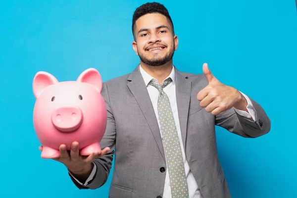 Hispanic Businessman Happy Expression Holding Piggy Bank — ストック写真