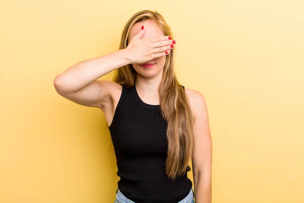 Young Adult Blonde Woman Covering Eyes One Hand Feeling Scared — Foto de Stock