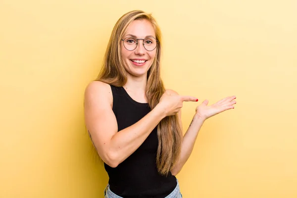Young Adult Blonde Woman Smiling Feeling Happy Carefree Satisfied Pointing — Stockfoto