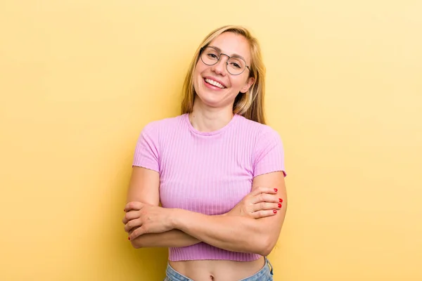 Young Adult Blonde Woman Laughing Happily Arms Crossed Relaxed Positive — Stockfoto