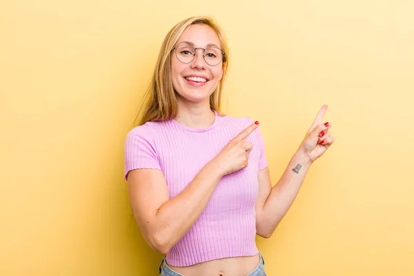 Young Adult Blonde Woman Smiling Happily Pointing Side Upwards Both — Foto Stock