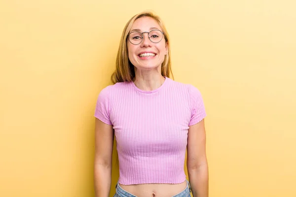 Young Adult Blonde Woman Looking Happy Goofy Broad Fun Loony — Stockfoto