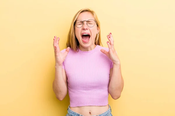 Young Adult Blonde Woman Furiously Screaming Feeling Stressed Annoyed Hands — Stockfoto