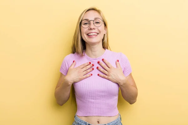 Young Adult Blonde Woman Looking Happy Surprised Proud Excited Pointing — ストック写真