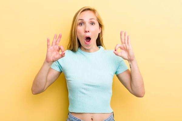 Young Adult Blonde Woman Feeling Shocked Amazed Surprised Showing Approval — Stock fotografie