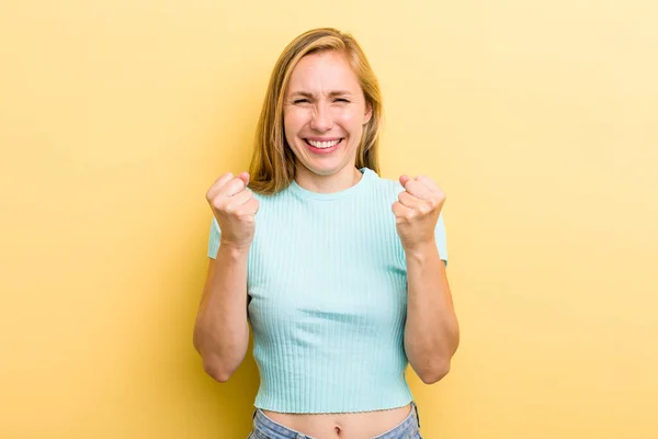 Young Adult Blonde Woman Shouting Triumphantly Laughing Feeling Happy Excited — Stockfoto